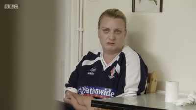 SHE SIGHS
She's doing this all... - This Country