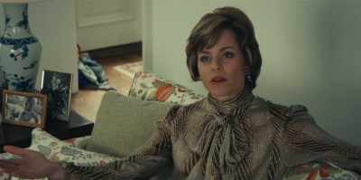 She speaks about
as much as any man." - Mrs. America