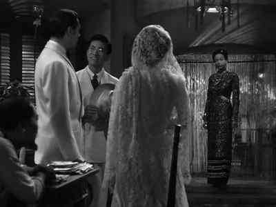 She speaks only Malay and Chinese. - The Letter