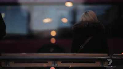 She was standing at a bus stop
on her way home from work - The Real Manhunter