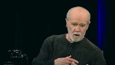 She took me in her arms,
two months, - George Carlin's American Dream