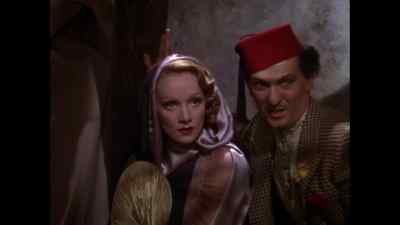 She wants money, madame.
Why doesn't he give it to her? - The Garden of Allah