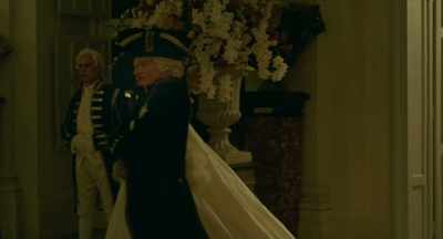 She is wearing a white dress. - Jeanne du Barry