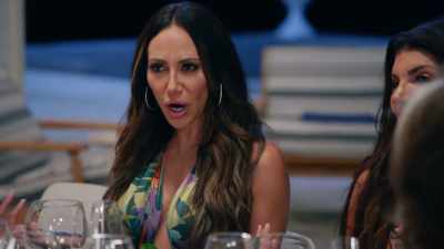 She wears a big black fur. - The Real Housewives Ultimate Girls Trip