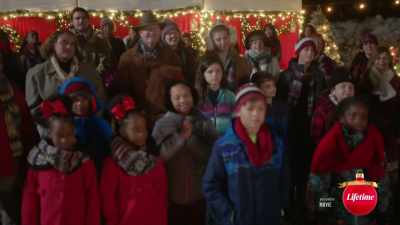 She whispers her secrets
to those of us - Under the Christmas Tree