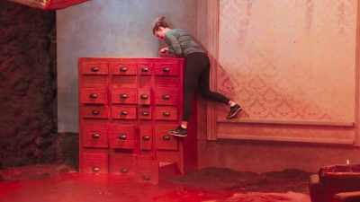 Sherrie, desperately reaching
for a drawer to stand on. - Floor Is Lava