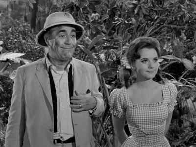 She's attracting
his attention. - Gilligan's Island
