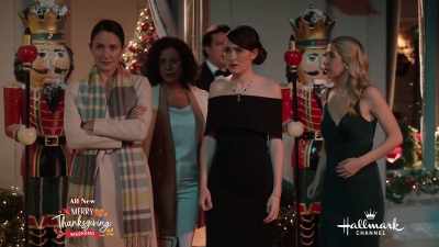 She's been lying to us.
This is the real Paige Monaghan. - Christmas at Castle Hart