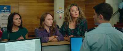 She's being officially questioned.
For what? Having a good time? - How to Please a Woman