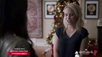 She's certainly trying her best. - Jingle Bell Bride