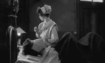 She's cleaning
my breathing tube. - Johnny Got His Gun