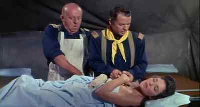 She's fainted, doc. - Apache Rifles