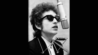 ♪ She's got everything
she needs - Bob Dylan: Odds and Ends