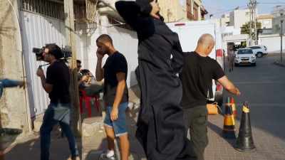 She's pumping herself up before
an intense action sequence - The Real Fauda