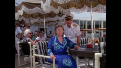 She's the one in the
pink and black bikini. - The Love Boat