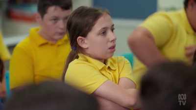 She's the one there
The headline says, - The School That Tried to End Racism