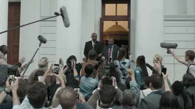 -(shutters snapping)
-(reporters clamoring) - Trackers