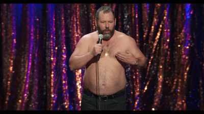 Silk robe, towel around his head,
stroking a kitty cat. - Bert Kreischer: Razzle Dazzle