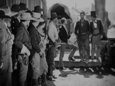 " Since when did the notorious
' Bull ' Stanley become so gallant ..." - 3 Bad Men
