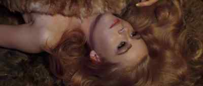 Since your garment is torn, help
yourself to my furs, Barbarella. - Barbarella