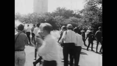 Singer: ♪ You wake up
One morning... ♪ - Raise Hell: The Life & Times of Molly Ivins