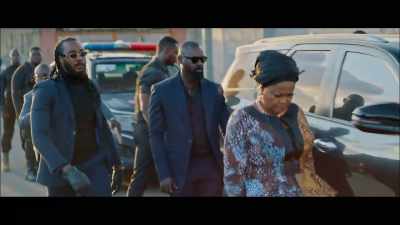 [singing continues in Yoruba] - King of Boys: The Return of the King