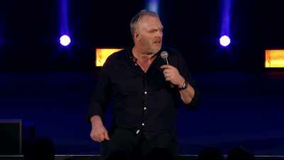 [singing gibberish] - Greg Davies: You Magnificent Beast