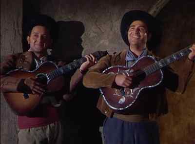 ♪♪ [ singing in spanish ] - The Loves of Carmen