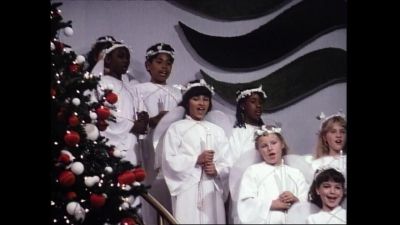 [Singing "o Christmas tree"
in German] - The Love Boat