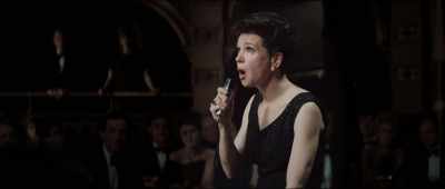 (SINGING)
Somewhere over the rainbow - Judy