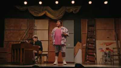 (SINGING)
Tell them how I am defying gravity - Theater Camp