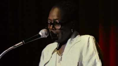[singing]
♪ We who believe in freedom
Cannot rest ♪ - Dear Mama