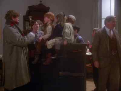 [SINGING "WE WISH YOU A MERRY
CHRISTMAS"] - An American Christmas Carol