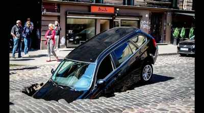 Sinkholes account
for $300 million - Sewer Divers