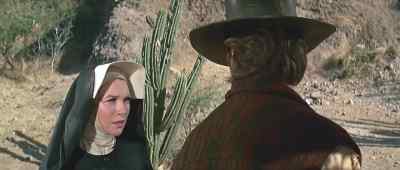 Sister I don't mind shootin' 'em for ya - Two Mules for Sister Sara