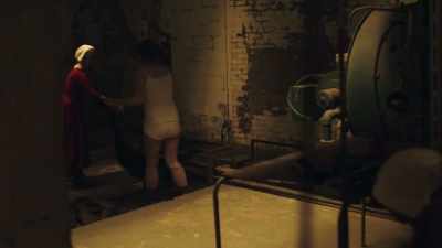 Sit here. - The Handmaid's Tale