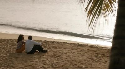 -Sitting down. - Death in Paradise