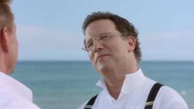 Six people on a beach - The In Laws