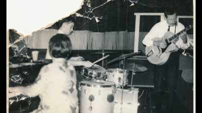 [Slim Jim Phantom] Sandy Nelson
I believe was the first one - Let There Be Drums!