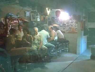 (slow country music)
(patrons chattering) - 92 in the Shade