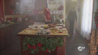 [smoke alarm beeping]
[Abby struggling] - A Christmas Recipe for Romance