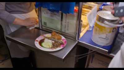 So we are in this "nasi lemak war zone." - Somebody Feed Phil