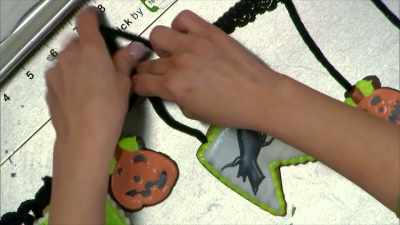 So I am stringing
my pipe cleaners - Halloween Cookie Challenge