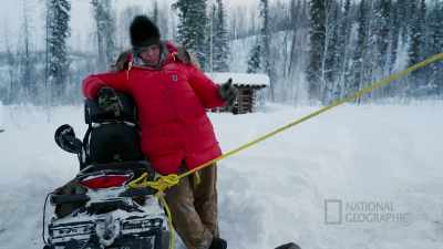 So I moved the snow machine
over here to tie him off - Life Below Zero: First Alaskans