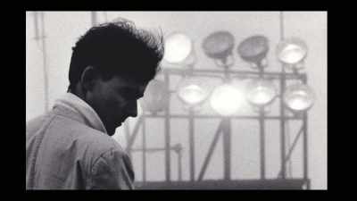 So Mick essentially walked out,
and I split with the band. - Simple Minds: Everything is Possible