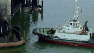 So smaller more maneuverable
harbor tug boats take over. - Europe From Above
