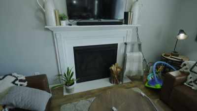 So, the fireplace
is a yay or nay
on doing like a fun tile here. - Down Home Fab