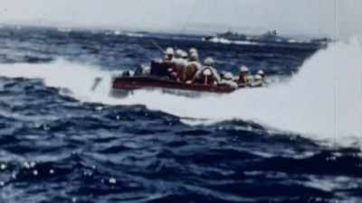 SO TROOPS DON'T HAVE TO GET
OUT ON THE EXPOSED BEACH. - The Pacific War in Color