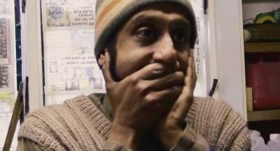 So why has she got her hands on her face Fess - Four Lions