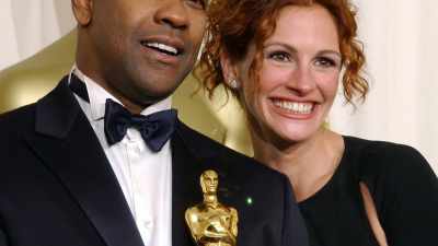 [soft instrumental music] - Denzel Washington: American Icon